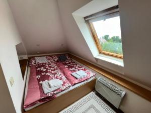 Posteľ alebo postele v izbe v ubytovaní Garden Atelier Lednice