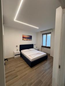 a bedroom with a bed in a room at IMPERIAL B&b in Bergamo