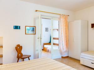 A bed or beds in a room at Residence Augusto