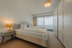 Posteľ alebo postele v izbe v ubytovaní Apartment Hotel Pfeifer