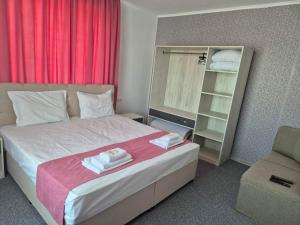 Postel nebo postele na pokoji v ubytování Dani beach Sozopol