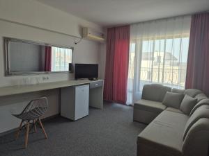 TV a/nebo společenská místnost v ubytování Dani beach Sozopol