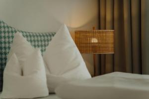 Posteľ alebo postele v izbe v ubytovaní Apartment Hotel Pfeifer