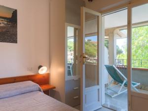 A bed or beds in a room at Residence Augusto