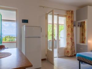A kitchen or kitchenette at Residence Augusto