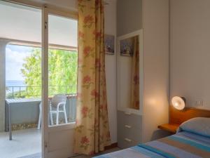 A bed or beds in a room at Residence Augusto