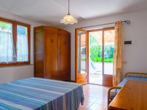 A bed or beds in a room at Residence Augusto