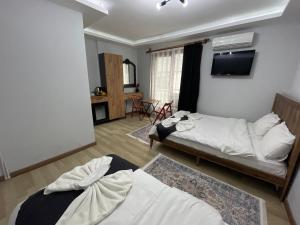 Postel nebo postele na pokoji v ubytování Le Valeria Deluxe