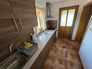 Kuchyň nebo kuchyňský kout v ubytování Spa Villa Ana