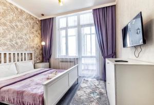 Μια τηλεόραση ή/και κέντρο ψυχαγωγίας στο Expo New Life Apartment