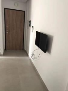 TV a/nebo společenská místnost v ubytování Cute 1 Bedroom Apt in Mrezga Hammamet