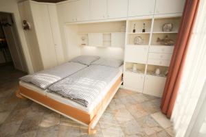Postel nebo postele na pokoji v ubytování Ferienwohnung Seesternresidenz App.12