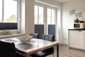 Kuchyň nebo kuchyňský kout v ubytování Ferienwohnung Sommerwind