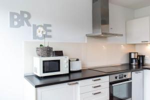 Kuchyň nebo kuchyňský kout v ubytování Ferienwohnung Sommerwind