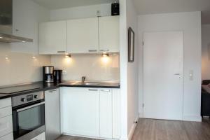 Kuchyň nebo kuchyňský kout v ubytování Ferienwohnung Sommerwind
