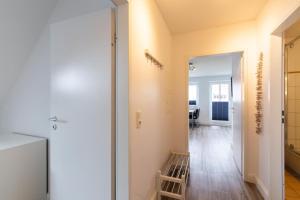 TV a/nebo společenská místnost v ubytování Ferienwohnung Sommerwind