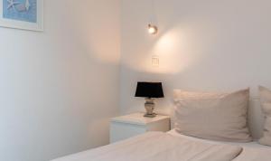 Postel nebo postele na pokoji v ubytování Ferienwohnung Sommerwind