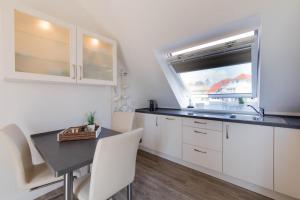 Kuchyň nebo kuchyňský kout v ubytování Ferienwohnung Ausblick
