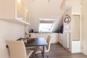Kuchyň nebo kuchyňský kout v ubytování Ferienwohnung Ausblick