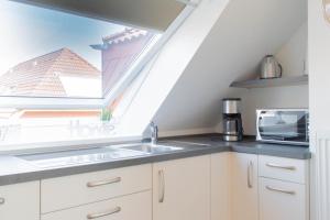 Kuchyň nebo kuchyňský kout v ubytování Ferienwohnung Ausblick