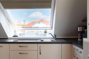 Kuchyň nebo kuchyňský kout v ubytování Ferienwohnung Ausblick