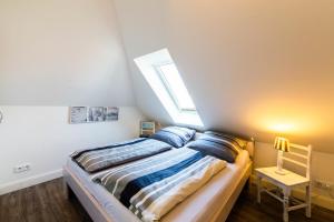 Postel nebo postele na pokoji v ubytování Ferienwohnung Ausblick