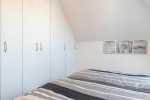 Postel nebo postele na pokoji v ubytování Ferienwohnung Ausblick