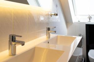 Koupelna v ubytování Ferienhaus Isabel + 37 fotografií