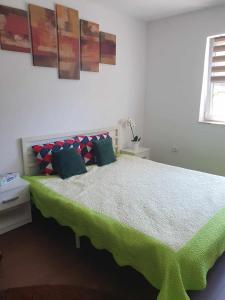 Postel nebo postele na pokoji v ubytování Casa Maksai