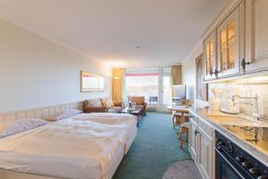 Kuchyň nebo kuchyňský kout v ubytování Ferienwohnung Residenz App 812 - Timmendorfer Strand