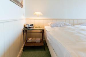 Postel nebo postele na pokoji v ubytování Ferienwohnung Residenz App 812 - Timmendorfer Strand