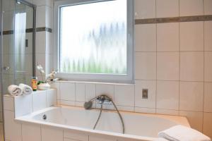 Koupelna v ubytování Ferienwohnung 1 Haus Meeresrauschen + 19 fotografií