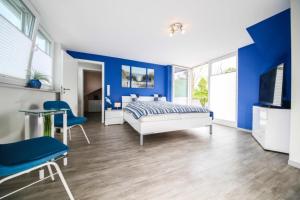 TV a/nebo společenská místnost v ubytování Ferienwohnung Glücksgefühl