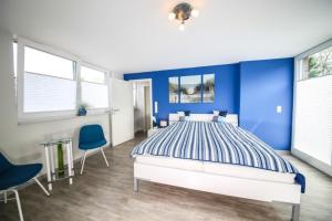 Postel nebo postele na pokoji v ubytování Ferienwohnung Glücksgefühl