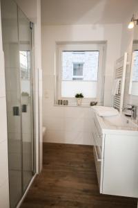 Ванная комната в Ferienwohnung Küstentraum