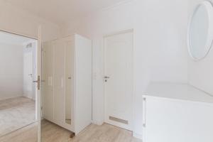 Postel nebo postele na pokoji v ubytování Ferienwohnung Strandkörbchen - Scharbeutz