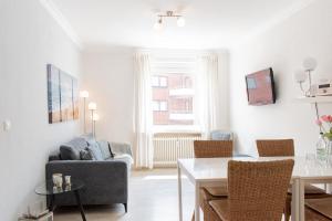 TV a/nebo společenská místnost v ubytování Ferienwohnung Strandkörbchen - Scharbeutz