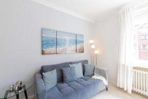 Posezení v ubytování Ferienwohnung Strandkörbchen - Scharbeutz