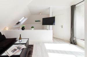 TV a/nebo společenská místnost v ubytování Ferienwohnung Relax