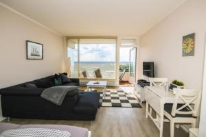 TV a/nebo společenská místnost v ubytování Ferienwohnung Residenz App. 327