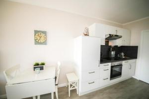 Kuchyň nebo kuchyňský kout v ubytování Ferienwohnung Residenz App. 327