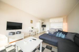 TV a/nebo společenská místnost v ubytování Ferienwohnung Residenz App. 327
