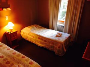 Cama ou camas em um quarto em Hotel Koi Mahik