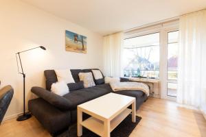 Posezení v ubytování Ferienwohnung Strandbude 11 -Timmendorfer Strand