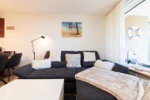 Postel nebo postele na pokoji v ubytování Ferienwohnung Strandbude 11 -Timmendorfer Strand