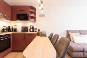 Kuchyň nebo kuchyňský kout v ubytování Ferienwohnung Strandbude 11 -Timmendorfer Strand