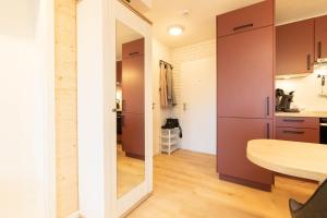 Kuchyň nebo kuchyňský kout v ubytování Ferienwohnung Strandbude 11 -Timmendorfer Strand