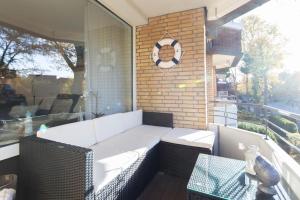 Posezení v ubytování Ferienwohnung Strandbude 11 -Timmendorfer Strand