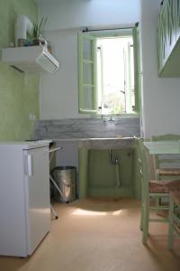 Kuchyň nebo kuchyňský kout v ubytování Tree Houses