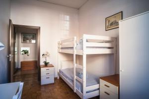 Ένα ή περισσότερα κρεβάτια σε δωμάτιο στο Residence Molinetto